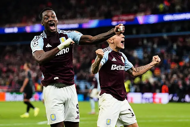 Aston Villa’s Jhon Duran (left) and Lucas Digne celebrate at the full-time whistle after their Champions League win against Bayern Munich at Villa Park