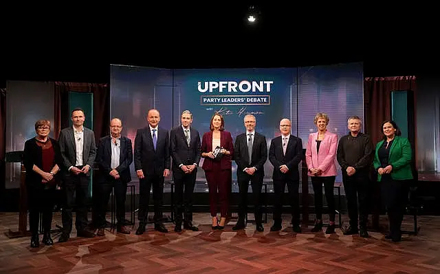 Party leaders standing next to each other in a TV studio