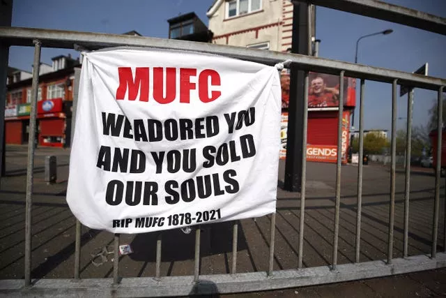 Manchester United fans protest against the club's plans to join the European Super League in April 2021