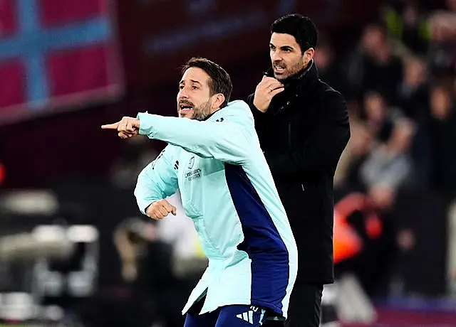 Arsenal set-piece coach Nicolas Jover (left) stands on the touchline with Mikel Arteta