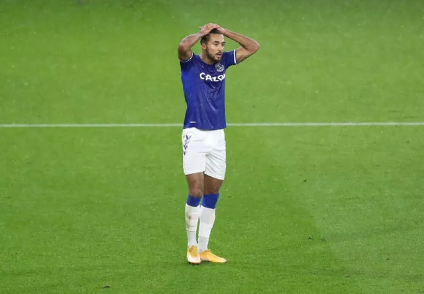 Everton striker Dominic Calvert-Lewin stands with his hands on his head