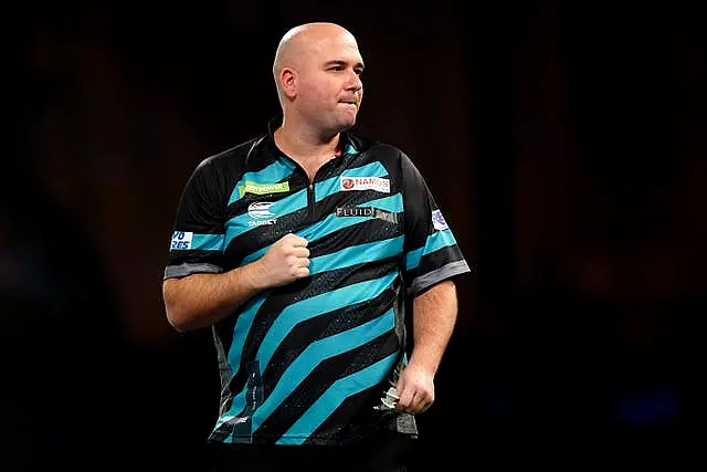 Rob Cross celebrates