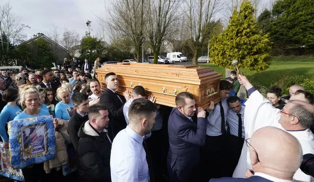 The coffin of John Keenan is carried into the Church of the Resurrection, Ballinfoyle 
