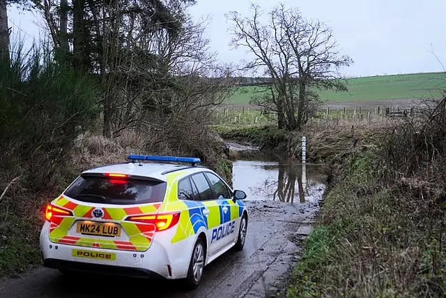 Police at the scene at River Aln near Alnwick, Northumberland