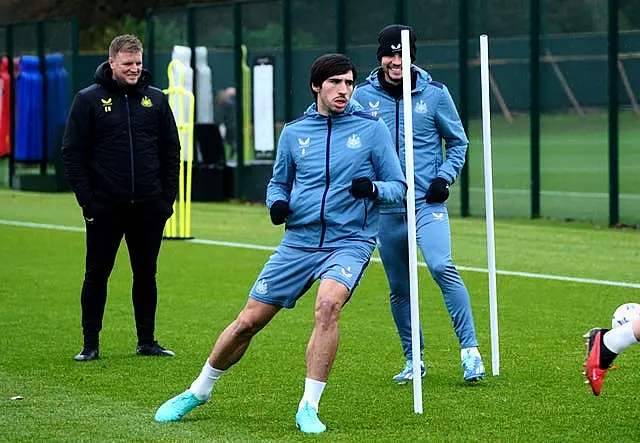 Newcastle midfielder Sandro Tonali trains under the watchful eye of head coach Eddie Howe