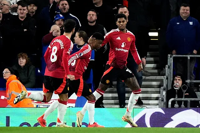 Manchester United’s Marcus Rashford (right) celebrates the opener at Ipswich