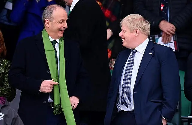 Taoiseach Micheal Martin with Prime Minister Boris Johnson in the stands ahead of a Guinness Six Nations match during his visit to the UK