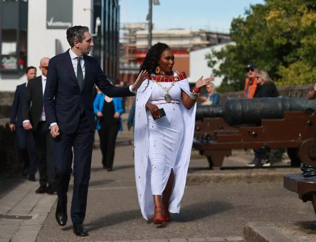 Taoiseach Simon Harris and Mayor of Derry City and Strabane District Council, Councillor Lilian Seenoi Barr outside the Guildhall