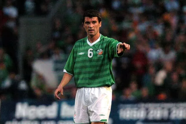 Manchester United and Republic of Ireland player Roy Keane calls out instructions to his team-mates during a game against Romania