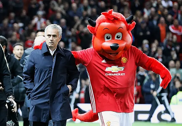 Then-Manchester United manager Jose Mourinho, with club mascot Fred The Red in 2016