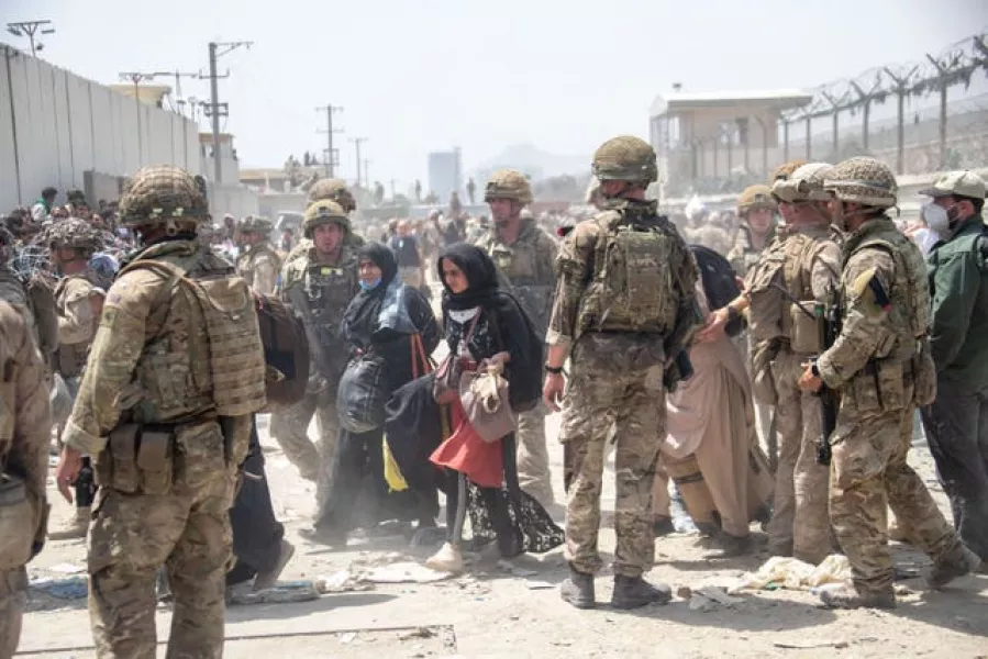 Troops help the evacuation out of Kabul