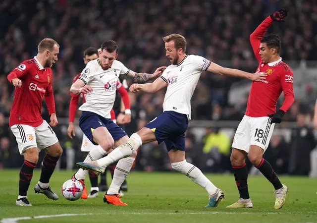 Harry Kane (centre) in action for Tottenham