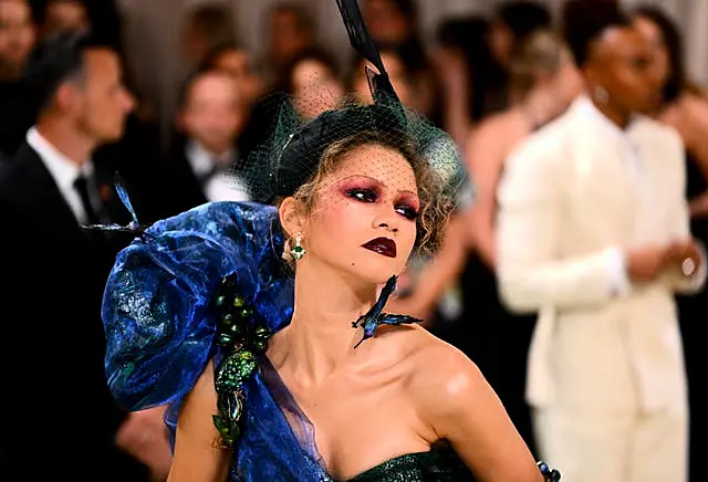 Zendaya in an elaborate dress and somewhat haughty pose at the Met Gala