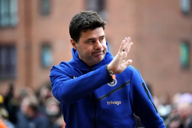 Former Chelsea manager Mauricio Pochettino waves to the fans ahead of the Premier League match at Wolves