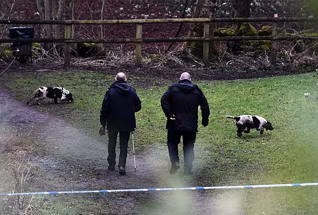 Police officers at the scene in Culcheth Linear Park near Warrington