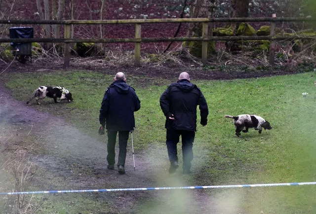 Police officers at the scene in Culcheth Linear Park near Warrington 