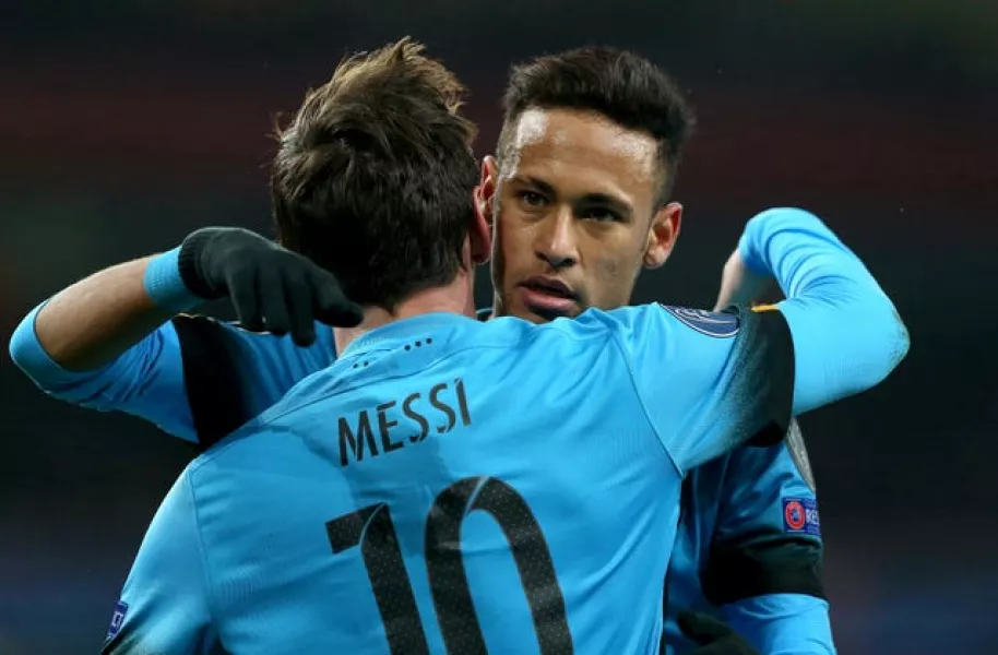 Neymar embraces Lionel Messi 