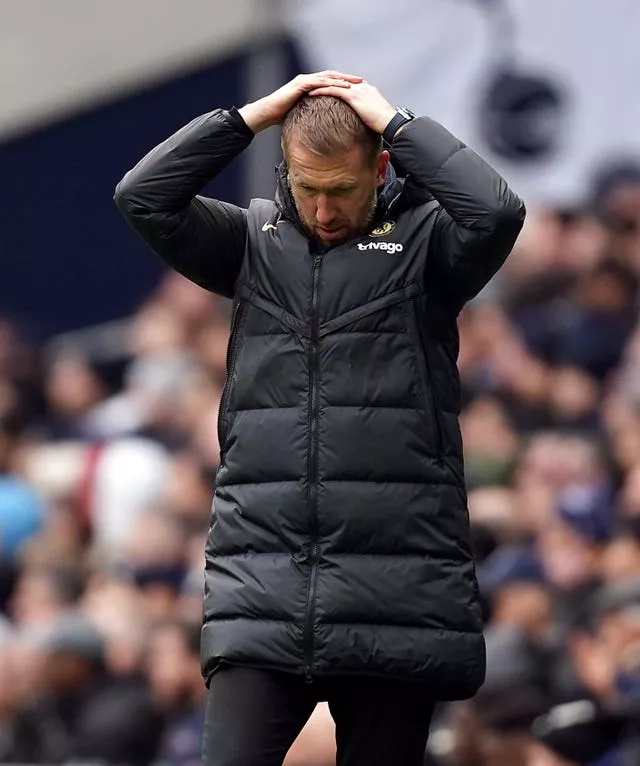 Graham Potter holds his head