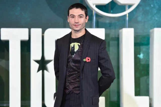 Ezra Miller attending a photocall for the film Justice League at the College, London