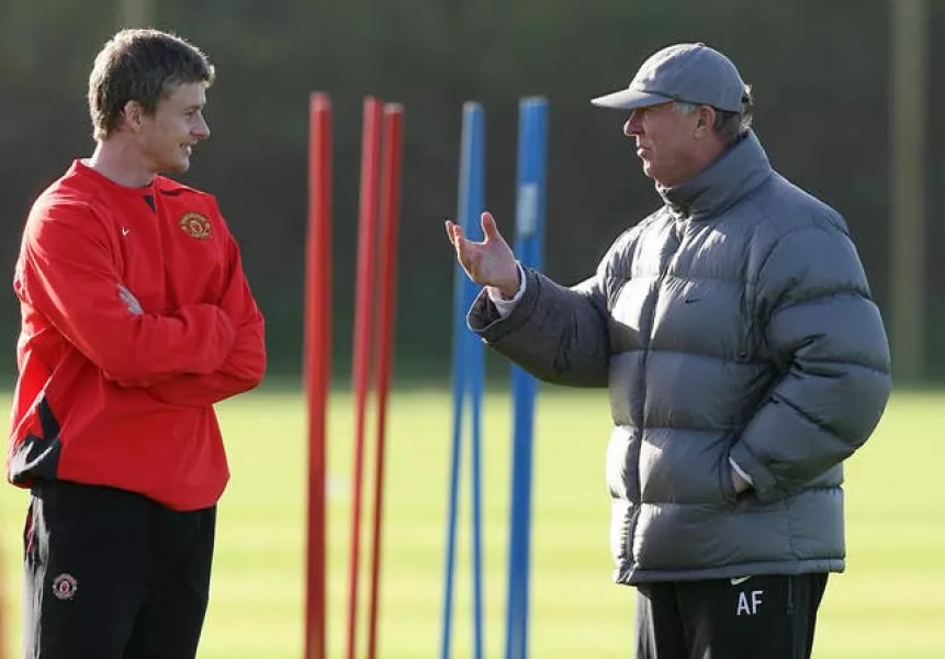 Ole Gunnar Solskjaer, left, and Sir Alex Ferguson