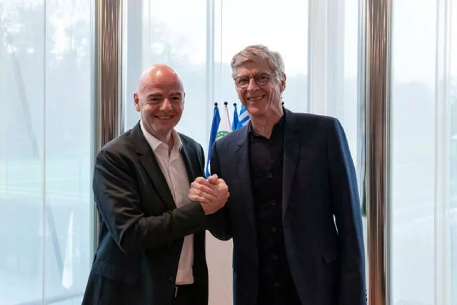 Arsene Wenger, right, with FIFA president Gianni Infantino 