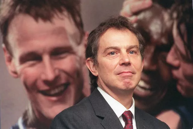 Then prime minister Tony Blair at the Football Association HQ in 1997