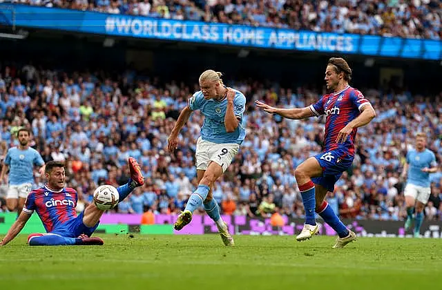 Erling Haaland, centre, completes his hat-trick against Crystal Palace