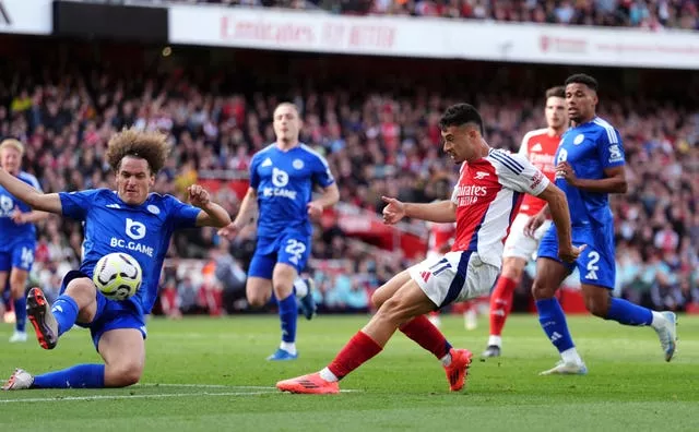 Gabriel Martinelli shoots with his right foot to open the scoring for Arsenal