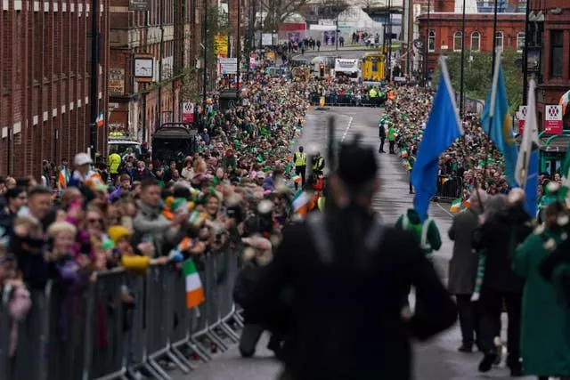 Crowds gather to watch performers take part in the St Patrick’s Day Parade in Birmingham