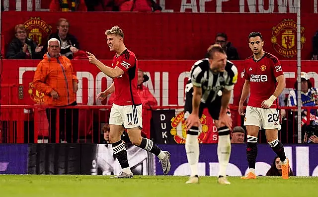 Rasmus Hojlund celebrates scoring United's third