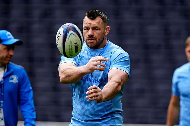 Cian Healy passes the ball during a Leinster training session