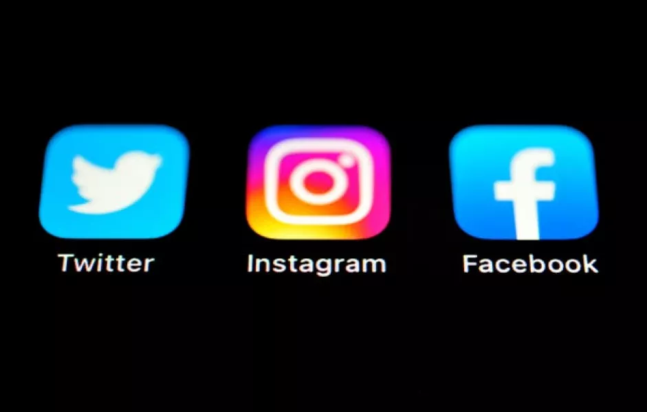 The Twitter, Instagram and Facebook Apps on an Iphone screen (Matthew Vincent/PA)