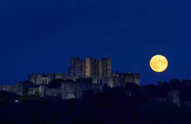 A supermoon above Dover Castle in Kent