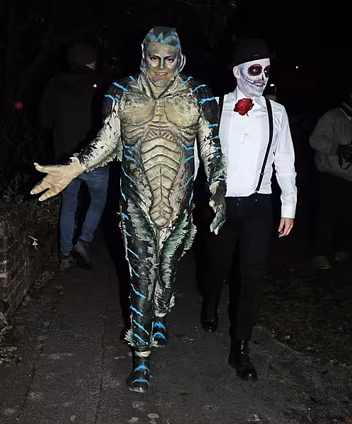 Alan Carr (left) and his husband Paul Drayton leaving a Halloween party hosted by Jonathan Ross
