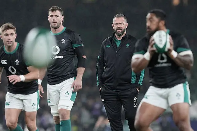 Ireland head coach Andy Farrell, centre right, watches the warm-up before Ireland's game against New Zealand