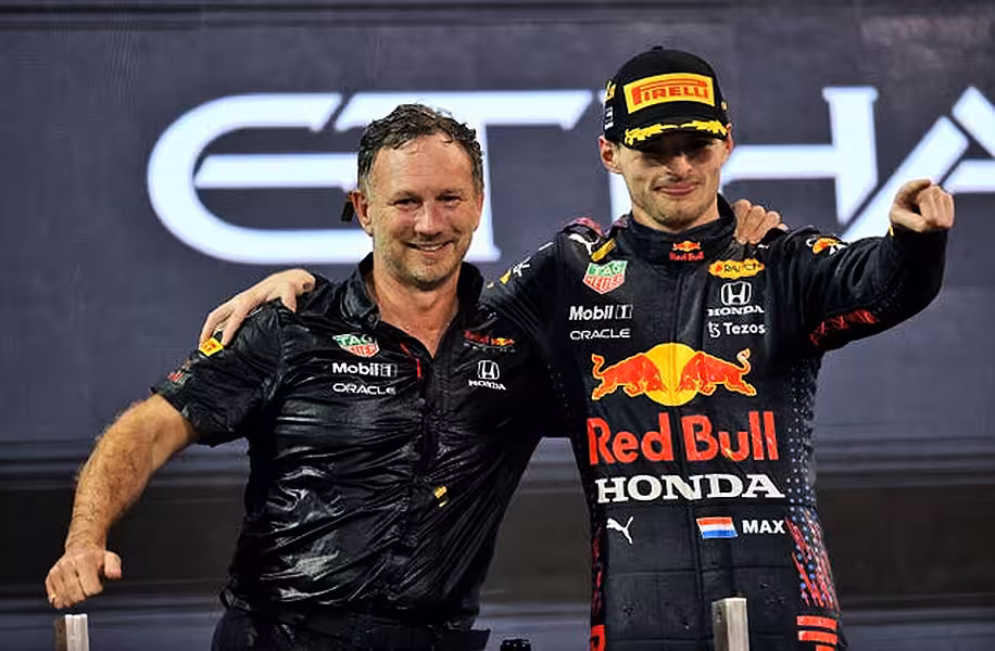 Verstappen alongside Red Bull team principal Christian Horner (PA).