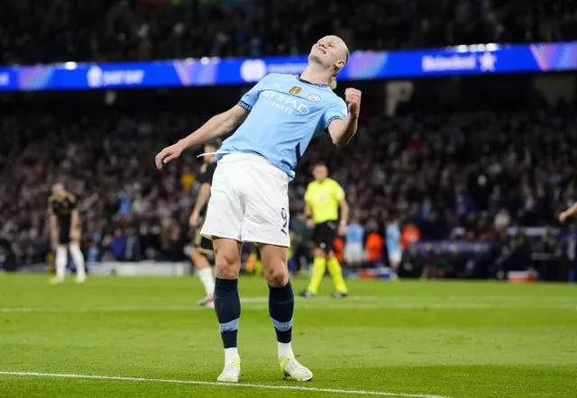 Erling Haaland celebrates scoring his side's fourth goal 