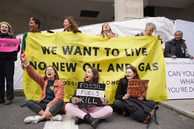Activists from Fossil Free London outside the InterContinental in central London