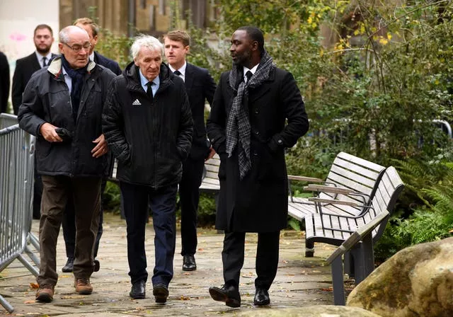 Former Manchester United players Paddy Crerand (centre) and Andy Cole (right) arrive at Manchester Cathedral (Andy Kelvin/PA)