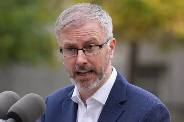 A close-up of Roderic O’Gorman speaking into a microphone