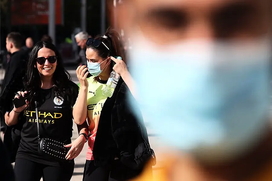 Mask wearing in public settings is expected to no longer be legally enforced after July 19