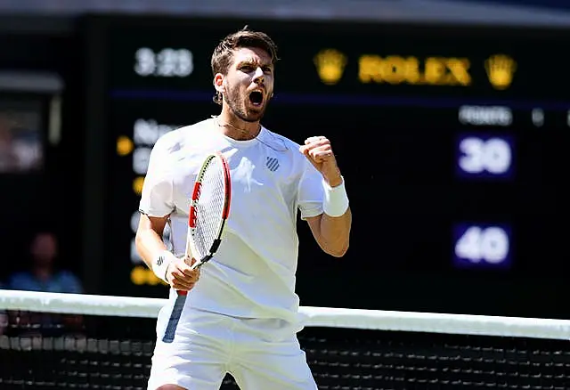 Cameron Norrie celebrates breaking serve in the first game