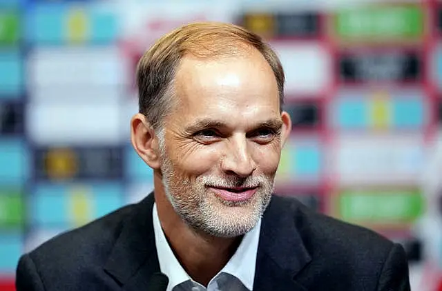 England head coach Thomas Tuchel smiles at a press conference