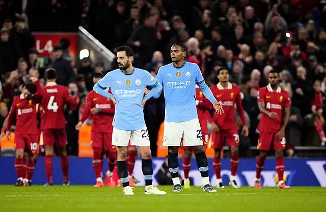 Manchester City’s Bernardo Silva and Manuel Akanji react after they concede a second goal during the Premier League defeat at Liverpool.