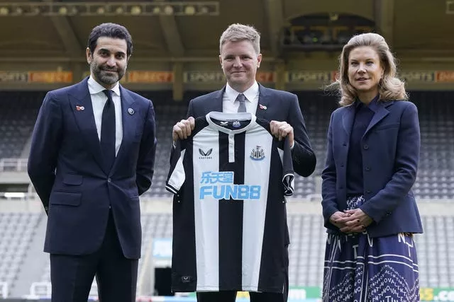 Newcastle have made significant strides since head coach Eddie Howe (centre) was appointed