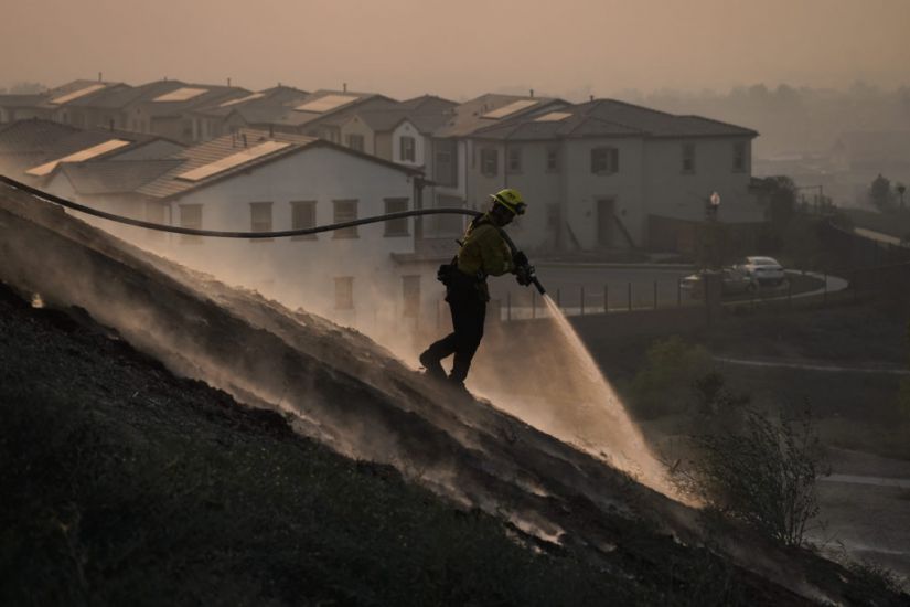Tens Of Thousands Evacuated As Crews Battle California Wildfires