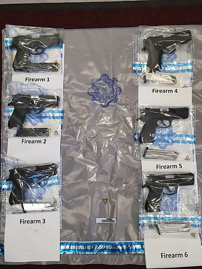 Two Men Arrested After Drugs And Handguns Found During Raids