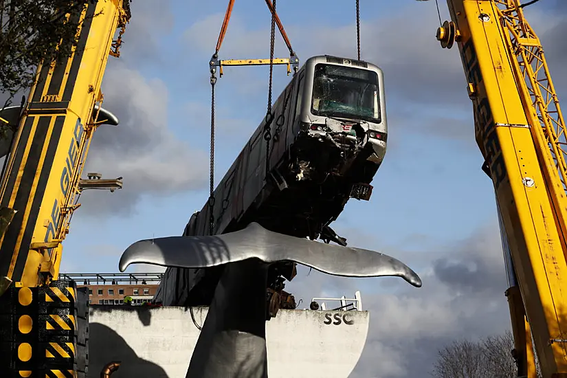 Cranes Lift Runaway Train Off Whale Sculpture In Rotterdam