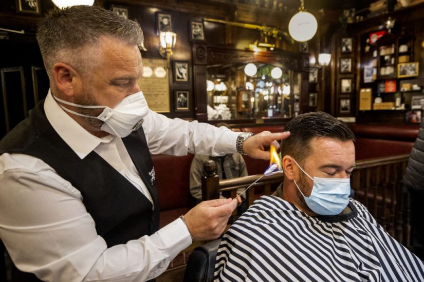 A Cut Above The Rest: Eight Gardaí Get Hair Cut At Pearse Street Garda Station