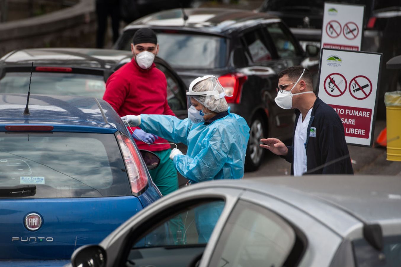 Health Workers At Cotugno Hospital Carry Out Pre-Triage To A Suspected Covid-19 Patient. Photo: Ivan Romano/Getty Images